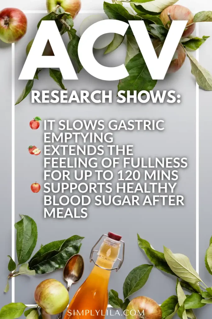 Apple cider vinegar bottle with fresh apples and leaves — ACV research shows it slows gastric emptying, extends fullness and supports healthy blood sugar