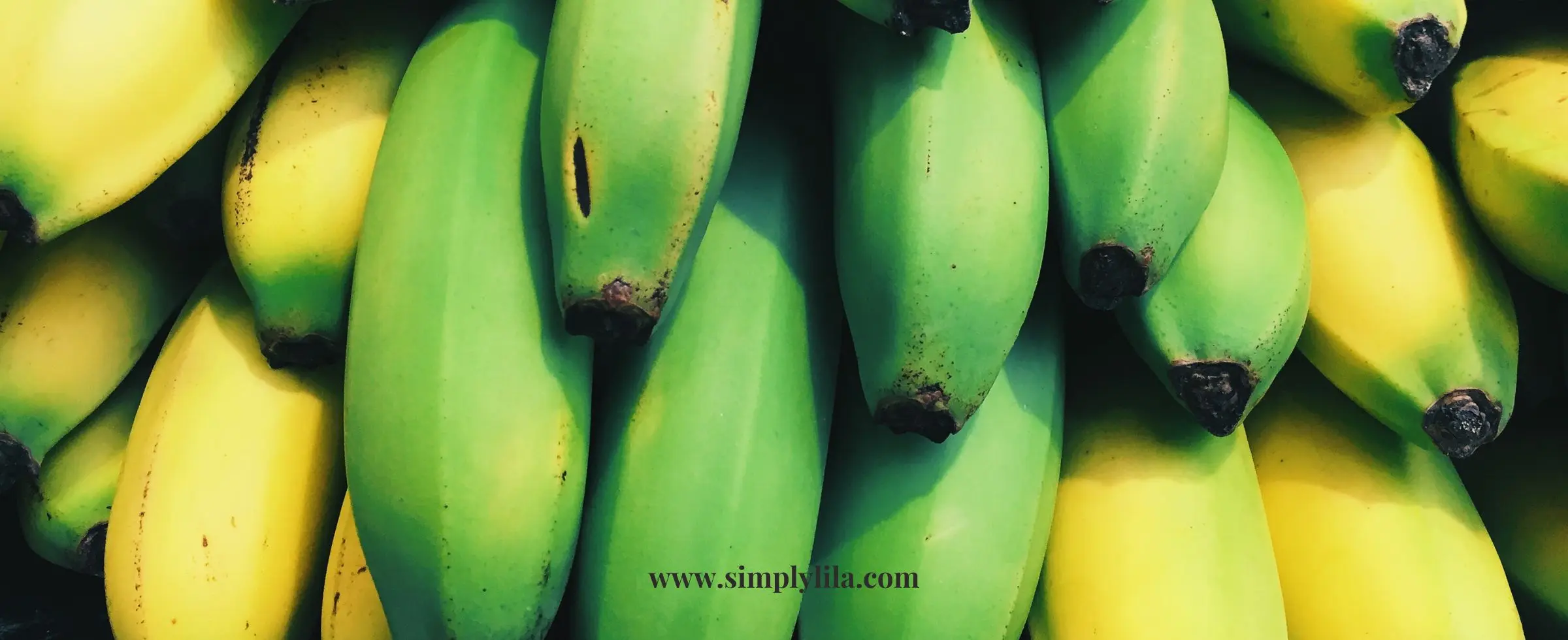 Close up of green and yellow bananas for natural skincare use
