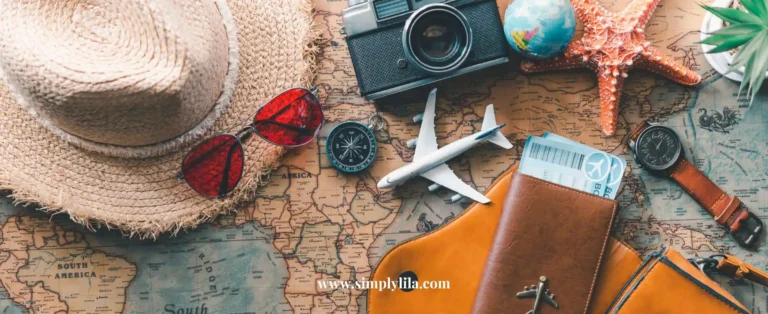 Flat-lay of travel essentials including straw hat, red sunglasses, vintage camera, compass, toy plane, passport wallet and boarding pass on a world map