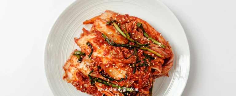 A white porcelain plate with fermented kimchi made of cabbage and different vegetables for gut health and flushing microplastics from the body