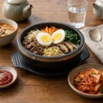A delicious dish served with kimchi on the side